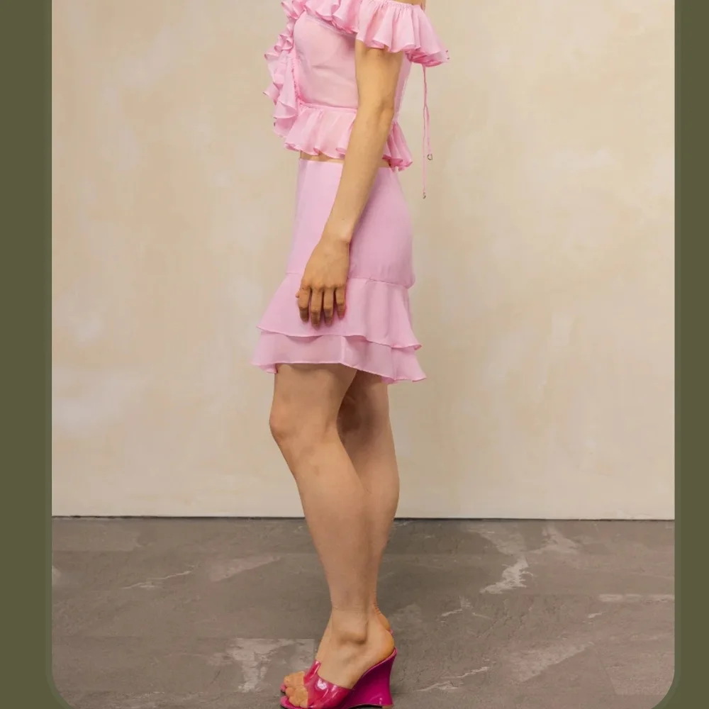 Chic Pink Ruffled Mini Skirt - Picture 1 of 5